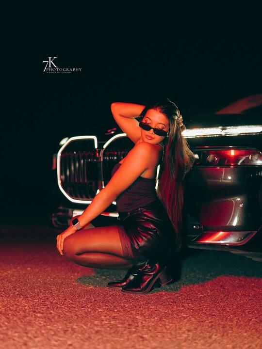 Against the rear of the car, red light