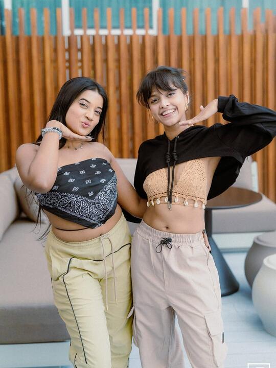 With a friend between shoots