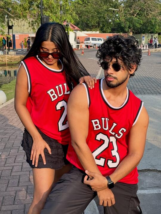 With a dance partner on location